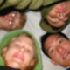 A very blurry photo of myself and three friends waiting under a tarp for George Lucas.
